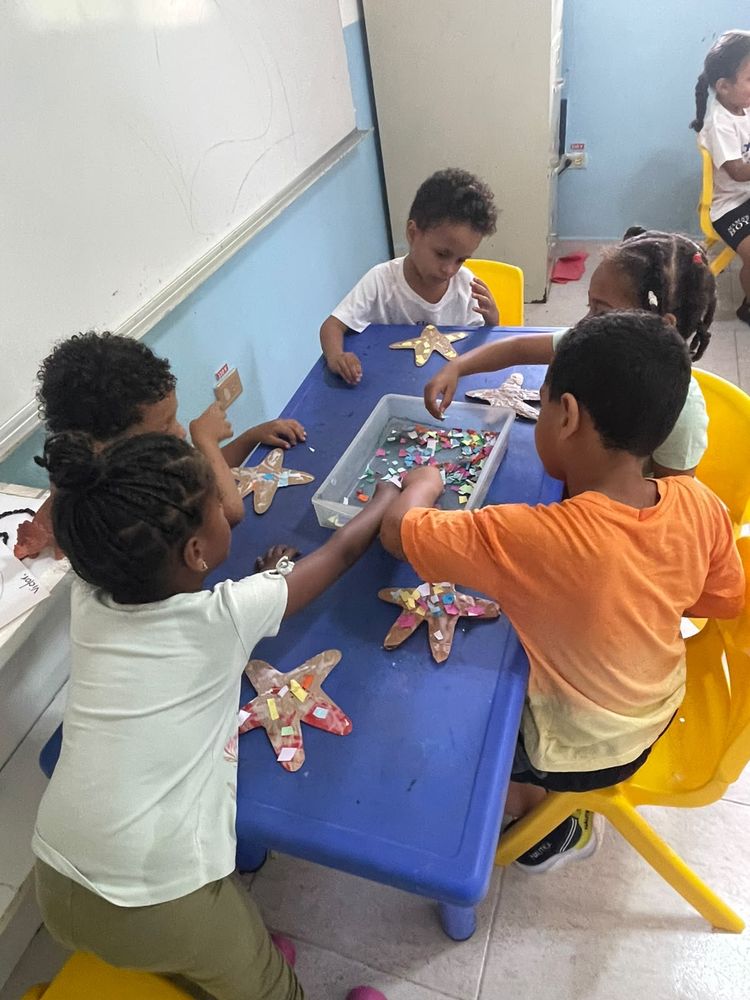 Children working together on a craft activity